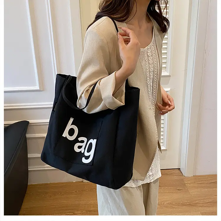 Women Canvas Tote Bag with "bag" Print — feature 17