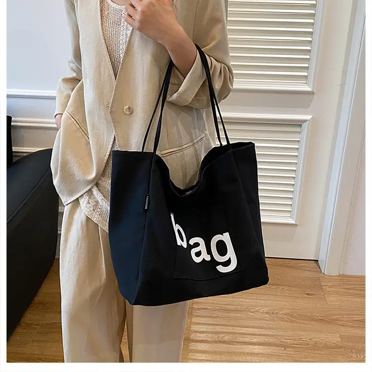 Women Canvas Tote Bag with "bag" Print — feature 18