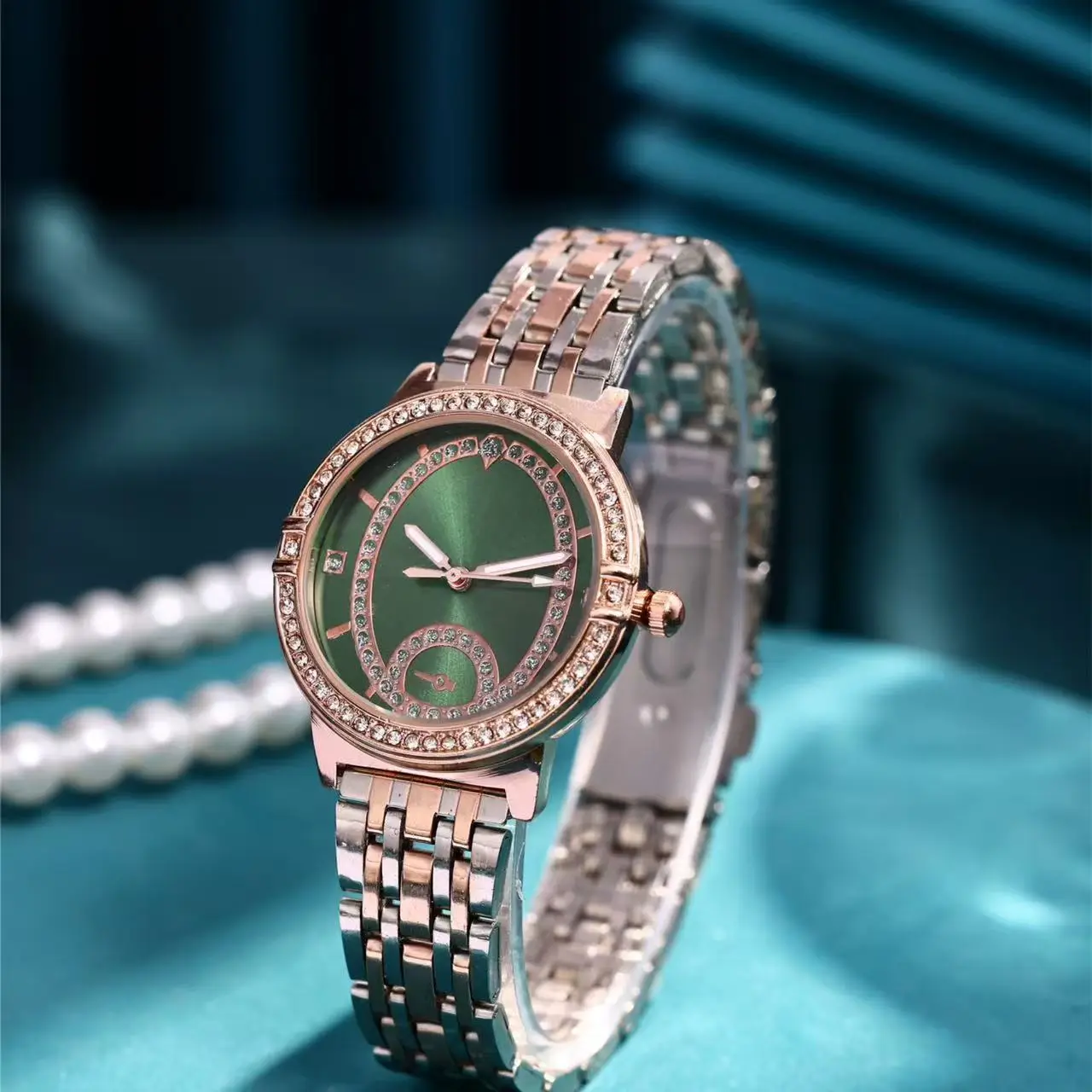 Women's Round Gold Watch with Diamond Inlay — feature 1