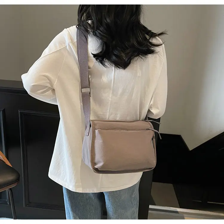 Lightweight Crossbody Bag with Multiple Compartments — feature 19