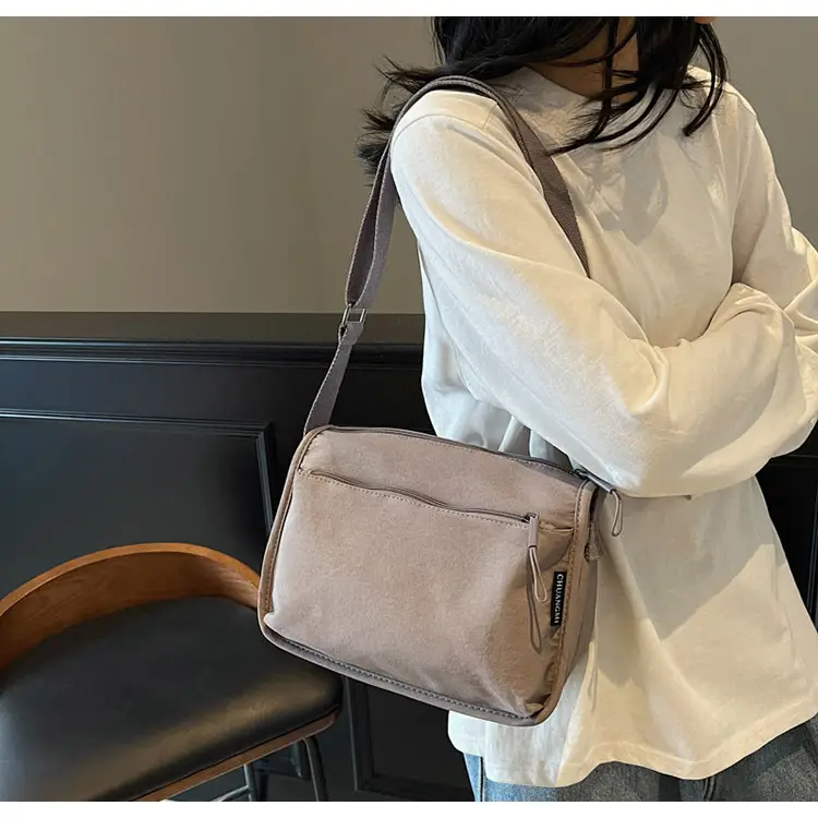 Lightweight Crossbody Bag with Multiple Compartments — feature 22