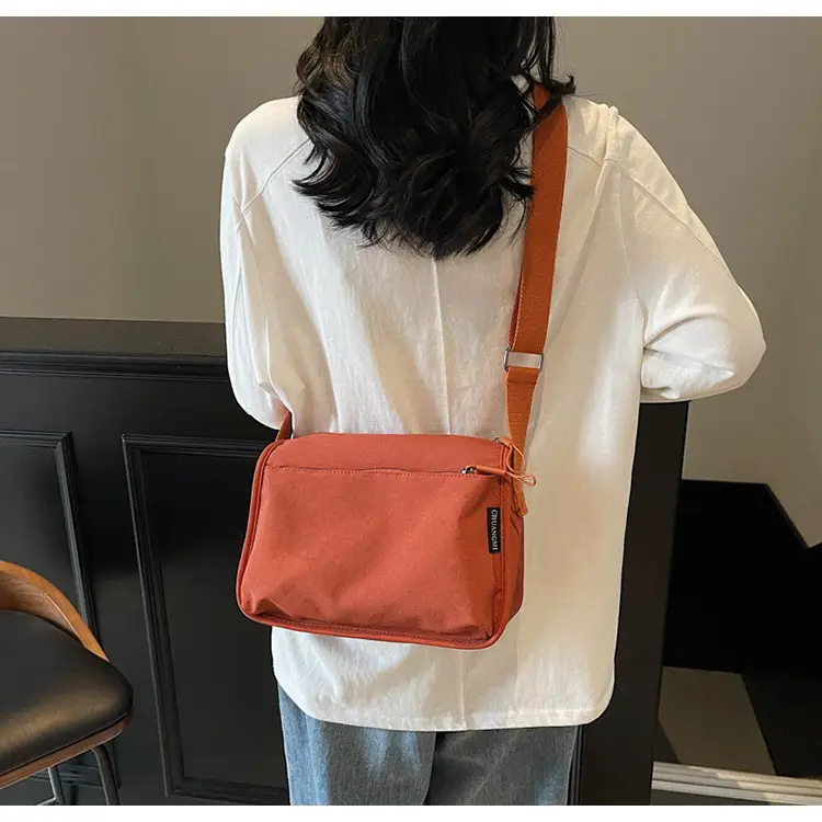 Lightweight Crossbody Bag with Multiple Compartments — feature 23