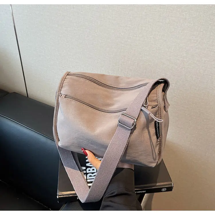 Lightweight Crossbody Bag with Multiple Compartments — feature 31