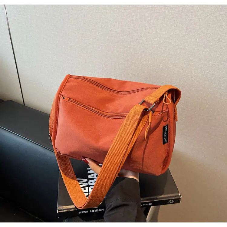 Lightweight Crossbody Bag with Multiple Compartments — feature 32