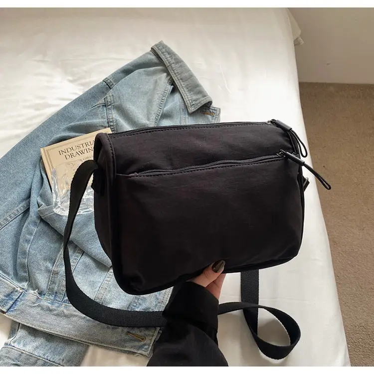 Lightweight Crossbody Bag with Multiple Compartments — feature 34