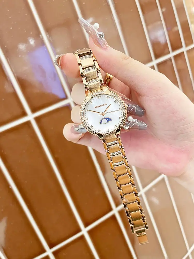 Moon Phase Women's Gold Diamond Bracelet Watch — feature 17