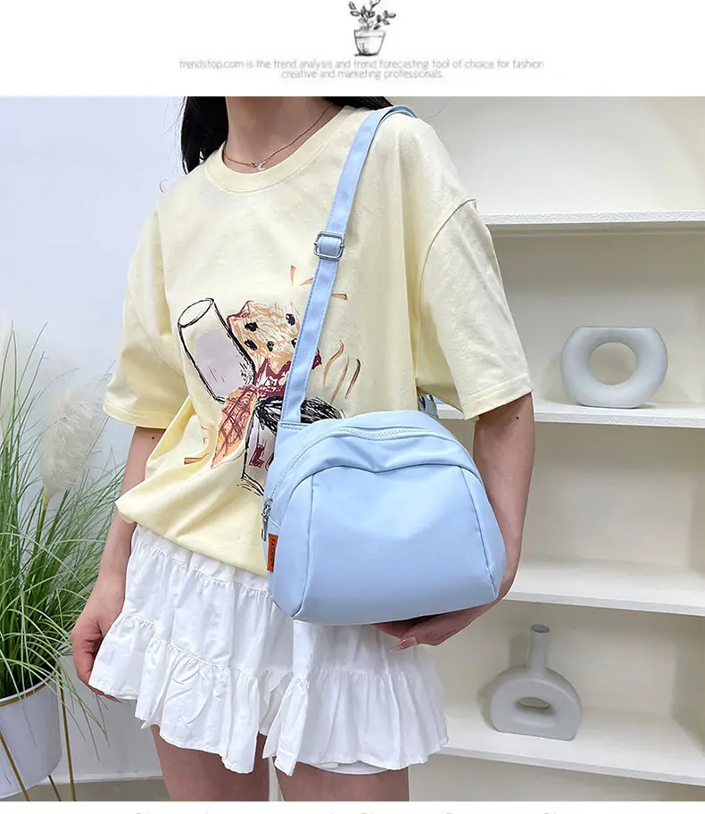 Light Blue Nylon Shoulder Bag Large Capacity Messenger Bag — feature 49