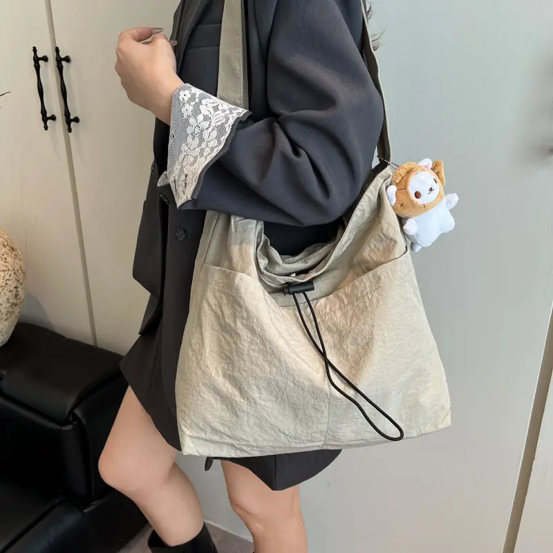 Women's Beige Drawstring Shoulder Bag with Cute Bear Earring - Image 9