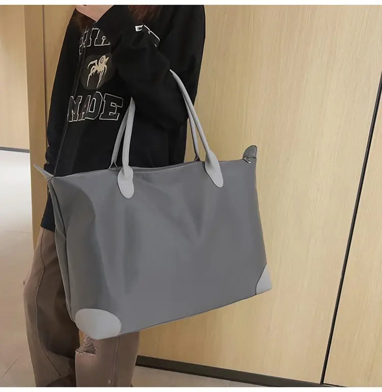 Large Capacity Men's Tote Bag Black 2026 — feature 16