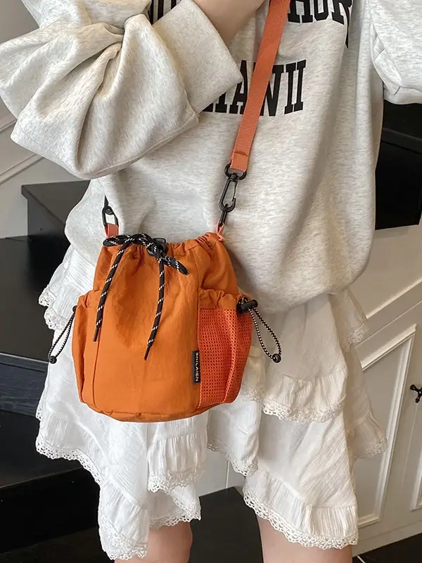 Orange Crossbody Bag for Women with Drawstring Closure