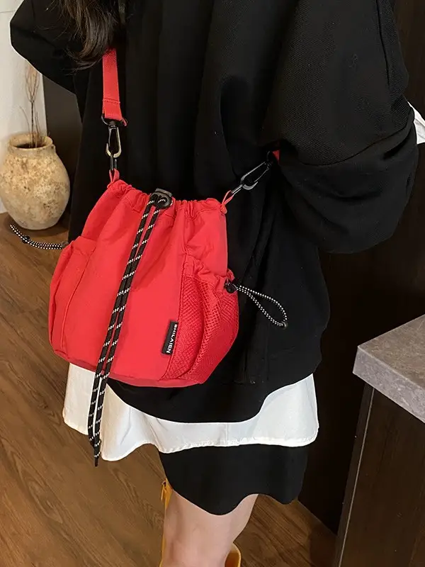 Orange Crossbody Bag for Women with Drawstring Closure