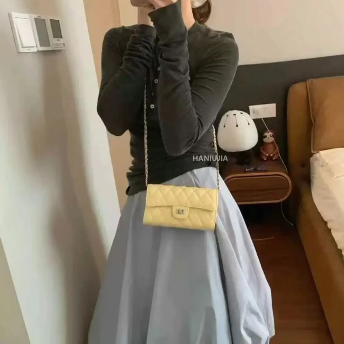 Tweed Off-Shoulder Top with White Clutch & Jeans Set — feature 6