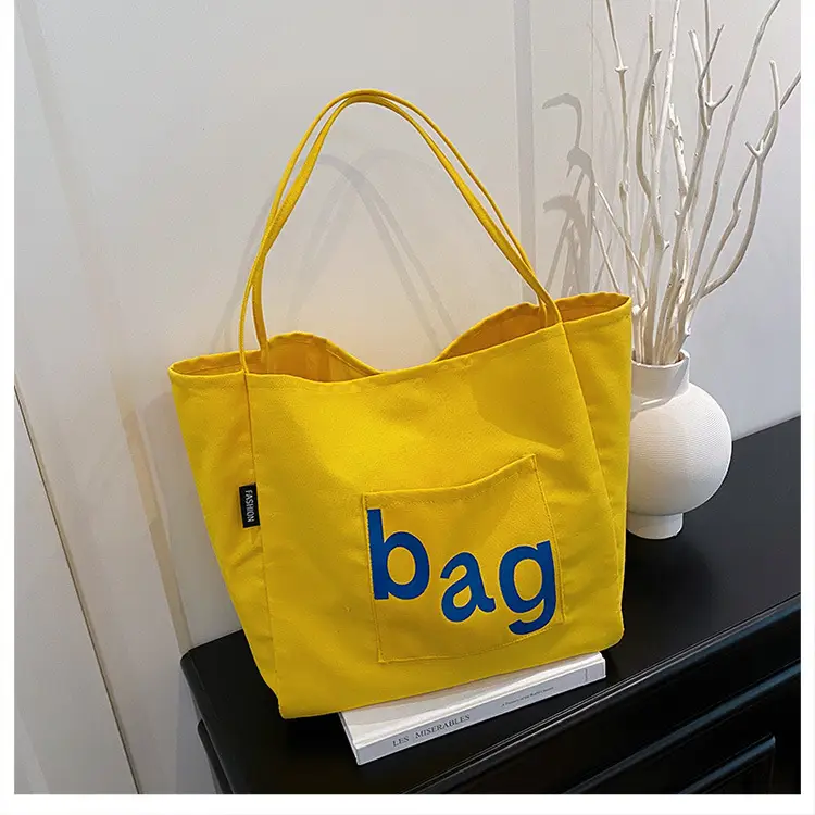 Yellow Canvas Shoulder Bag with "bag" Print for Women — feature 24