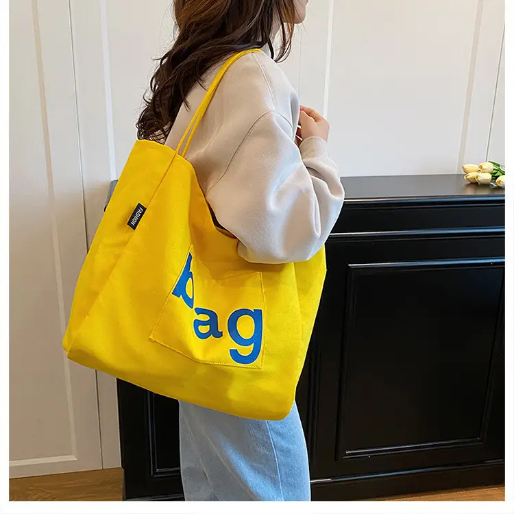Yellow Canvas Shoulder Bag with "bag" Print for Women — feature 34
