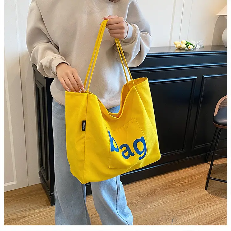 Yellow Canvas Shoulder Bag with "bag" Print for Women — feature 36