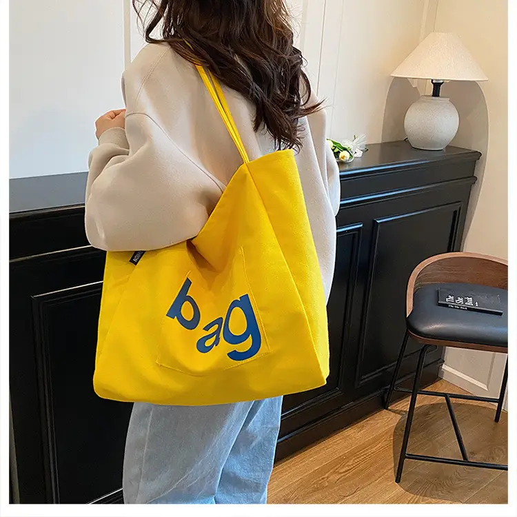 Yellow Canvas Shoulder Bag with "bag" Print for Women — feature 38