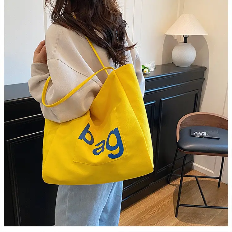 Yellow Canvas Shoulder Bag with "bag" Print for Women — feature 39