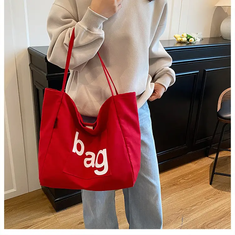 Yellow Canvas Shoulder Bag with "bag" Print for Women — feature 40