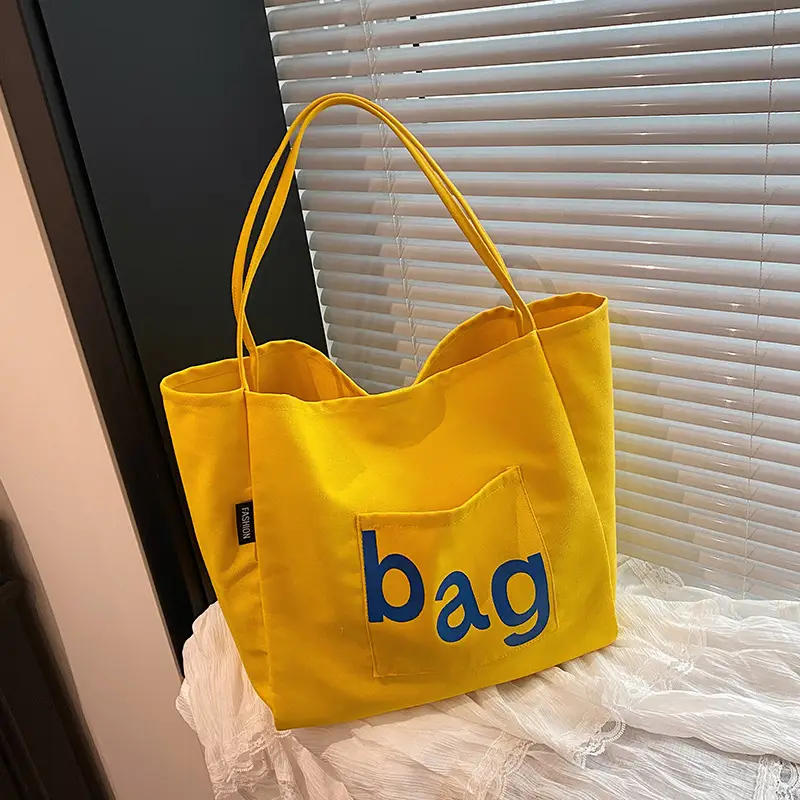 Yellow Canvas Shoulder Bag with "bag" Print for Women - Image 3