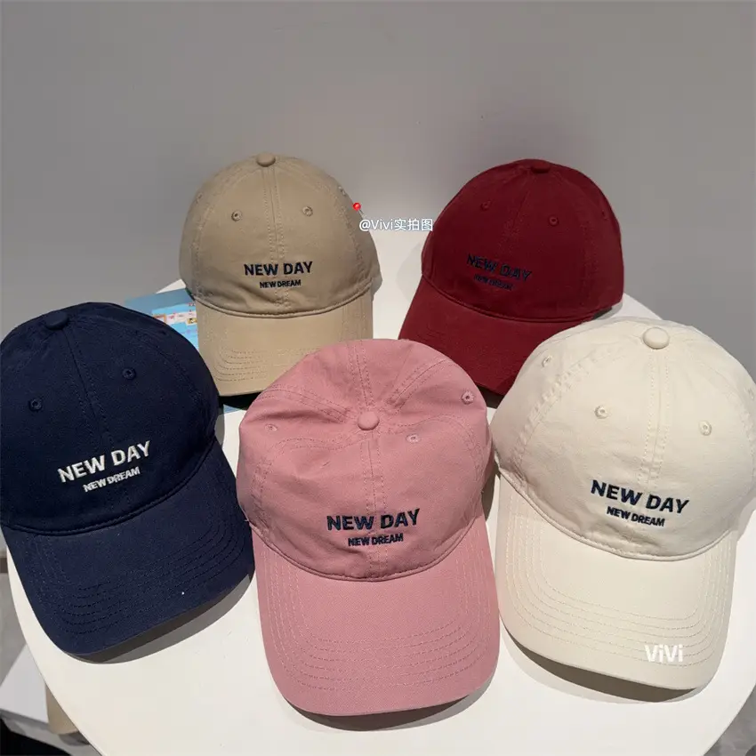 New Day Embroidered Duckbill Caps Unisex — feature 1