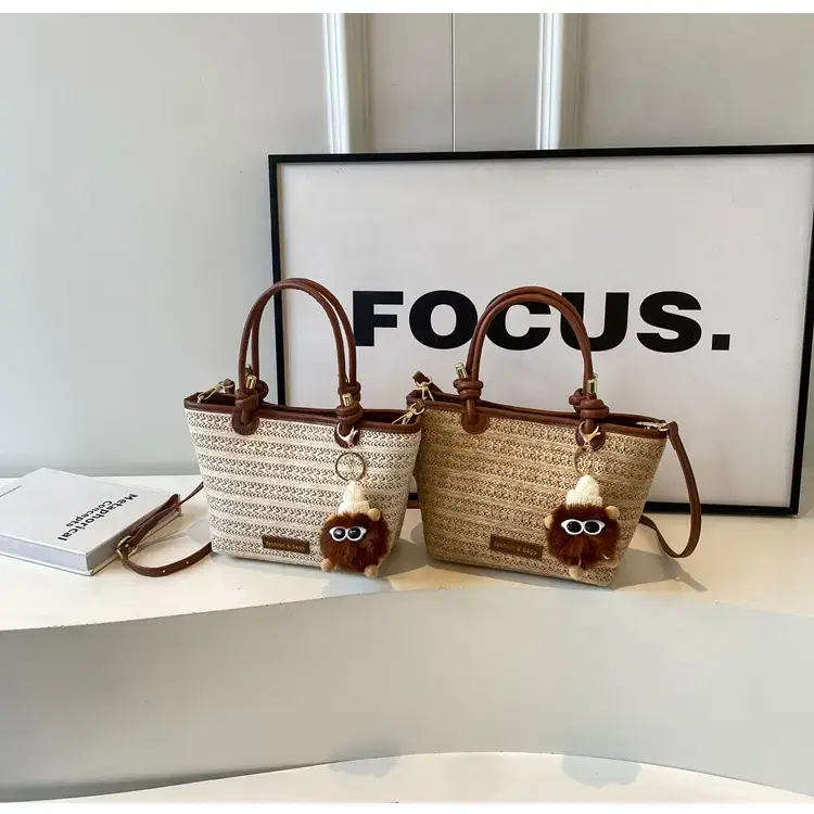 Women Woven Straw Tote Bag with Teddy Bear Charm — feature 1