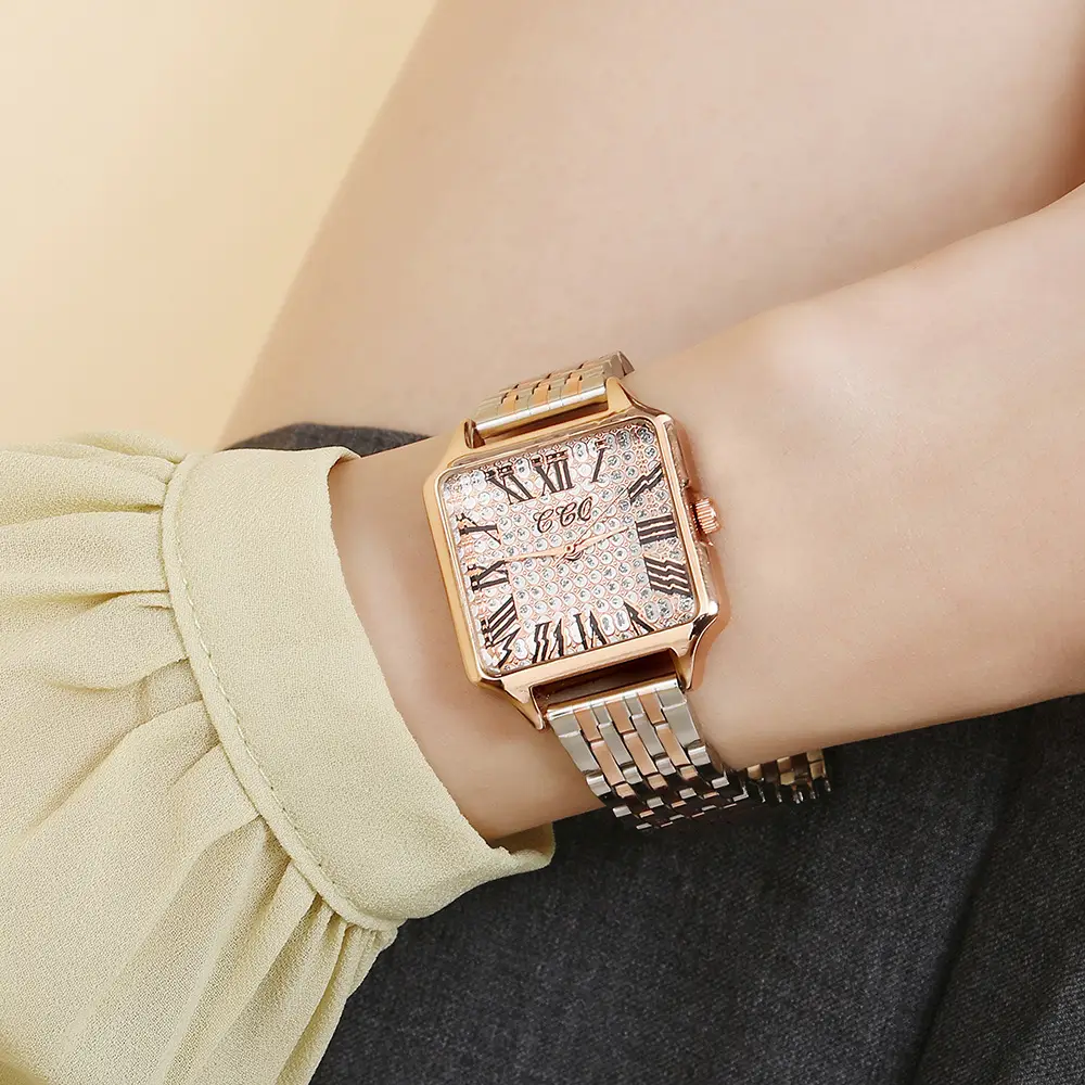 Women's Rose Gold Roman Numeral Watch with Diamond Band — feature 1