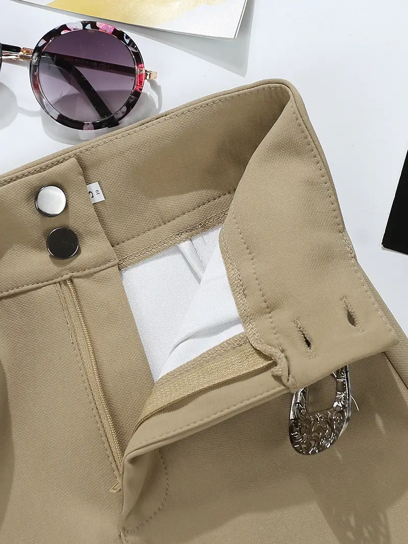 Women Khaki Belted Shorts with Retro Accessories — feature 6