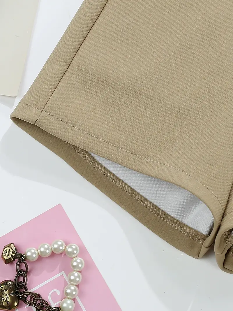 Women Khaki Belted Shorts with Retro Accessories — feature 8