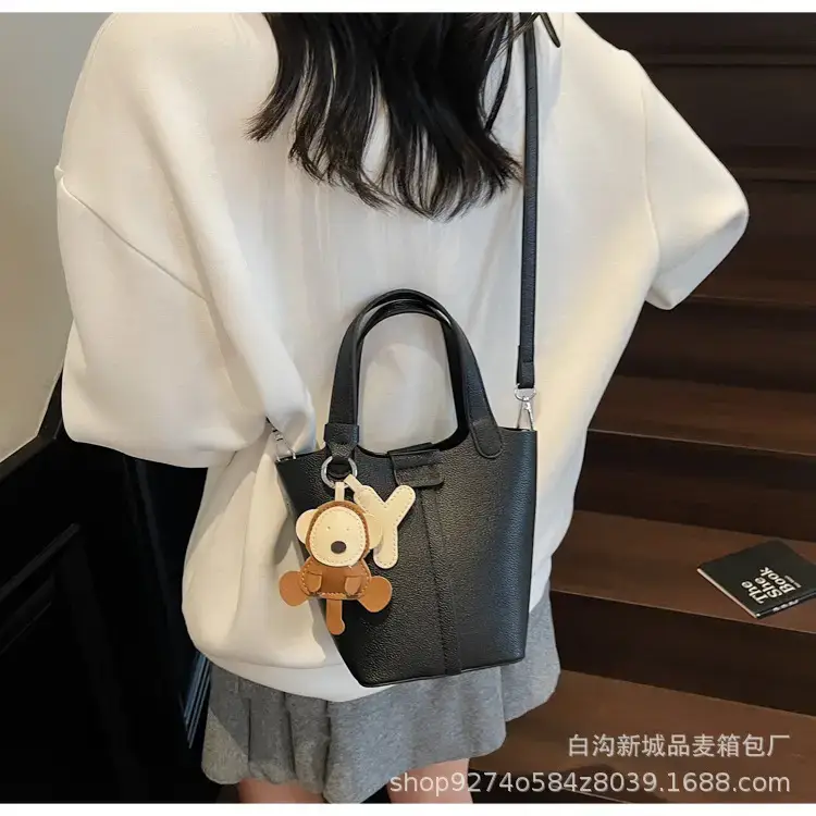 Women's New 2026 Lychee Handbag with Yellow Charm — feature 16