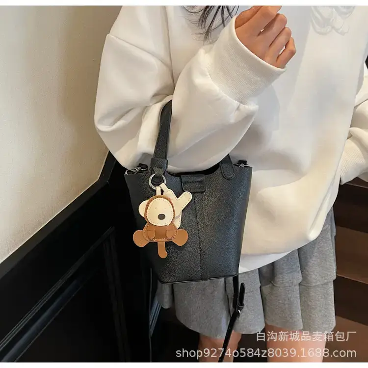 Women's New 2026 Lychee Handbag with Yellow Charm — feature 17