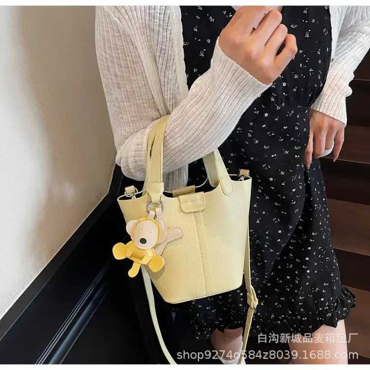 Women's New 2026 Lychee Handbag with Yellow Charm — feature 23