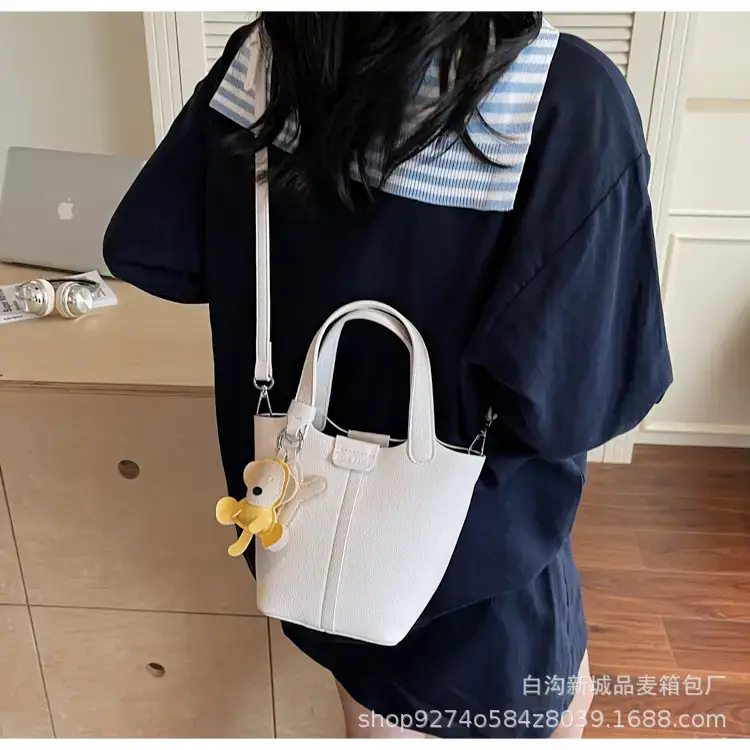 Women's New 2026 Lychee Handbag with Yellow Charm — feature 27