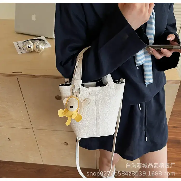 Women's New 2026 Lychee Handbag with Yellow Charm — feature 28