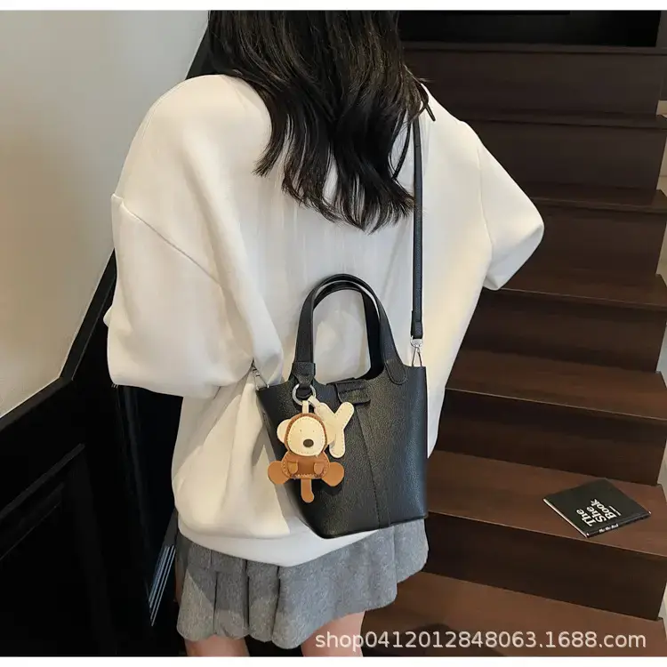 Beige Lychee Bucket Bag with Charm & Strap — feature 16