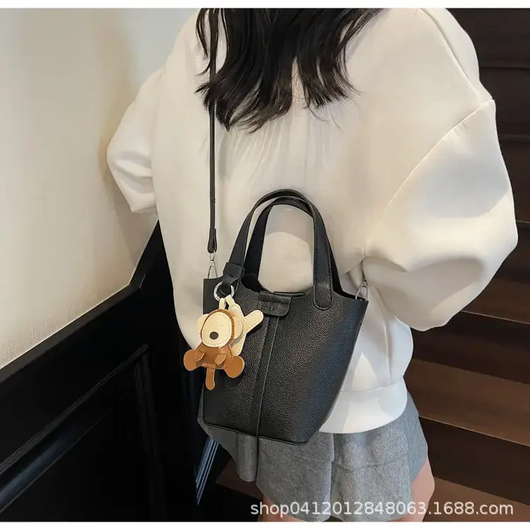 Beige Lychee Bucket Bag with Charm & Strap — feature 17