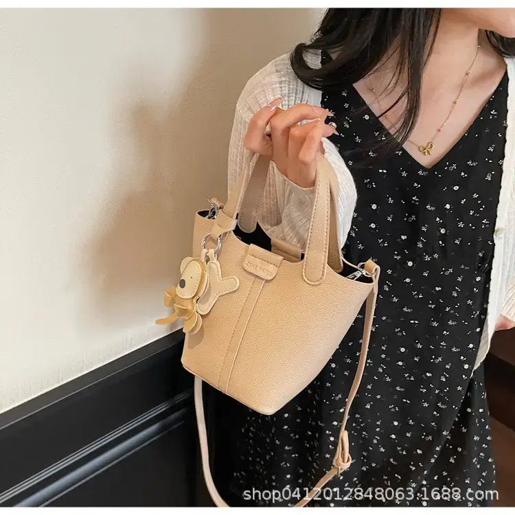 Beige Lychee Bucket Bag with Charm & Strap — feature 21