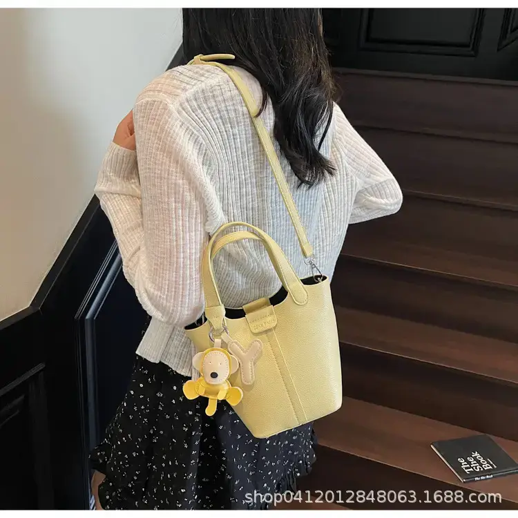 Beige Lychee Bucket Bag with Charm & Strap — feature 22
