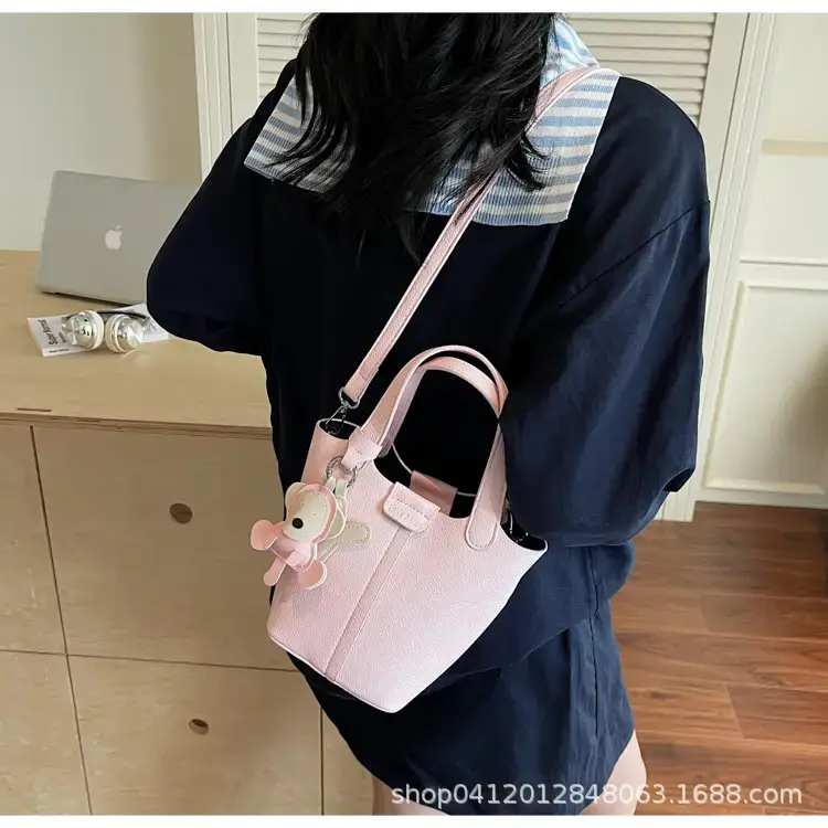Beige Lychee Bucket Bag with Charm & Strap — feature 24