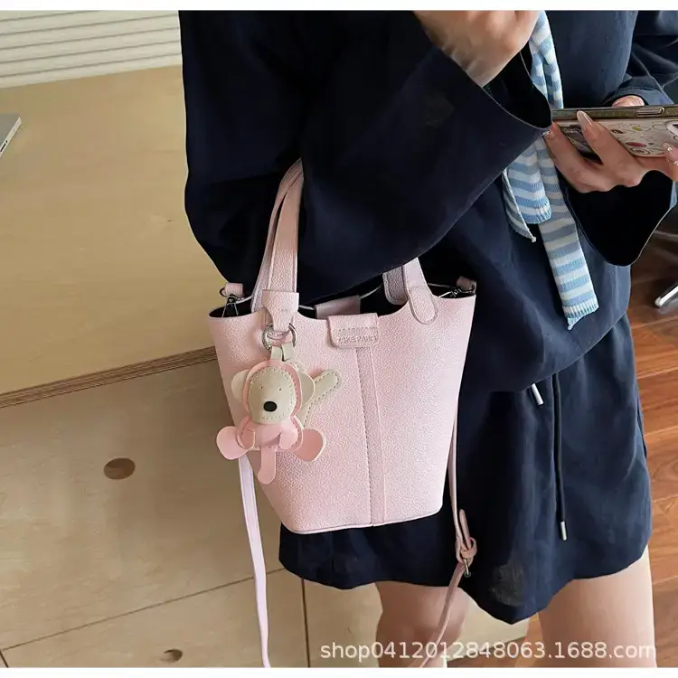 Beige Lychee Bucket Bag with Charm & Strap — feature 26
