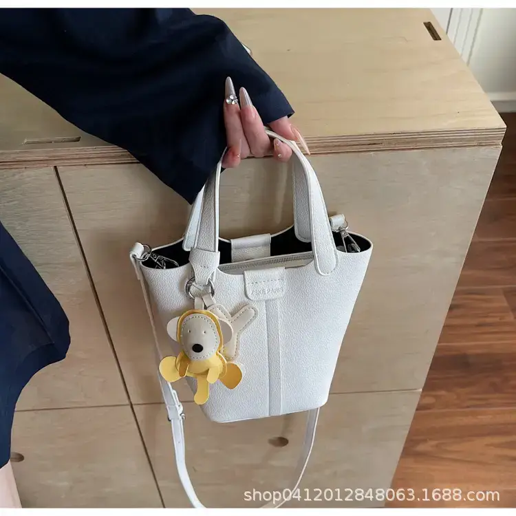 Beige Lychee Bucket Bag with Charm & Strap — feature 29