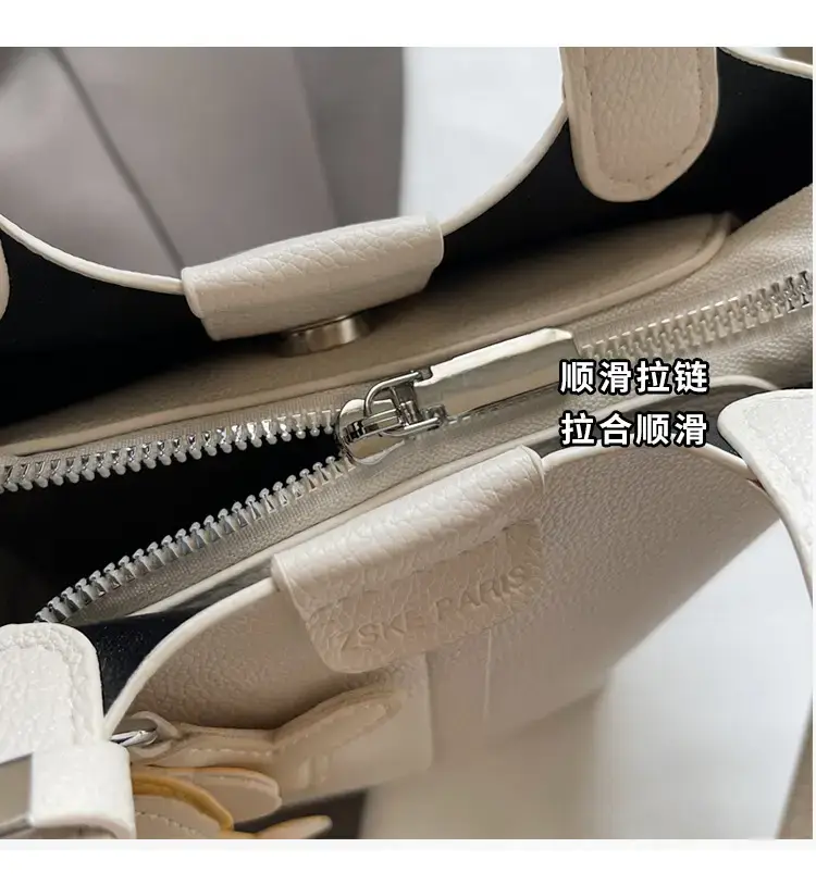 Beige Lychee Bucket Bag with Charm & Strap — feature 5