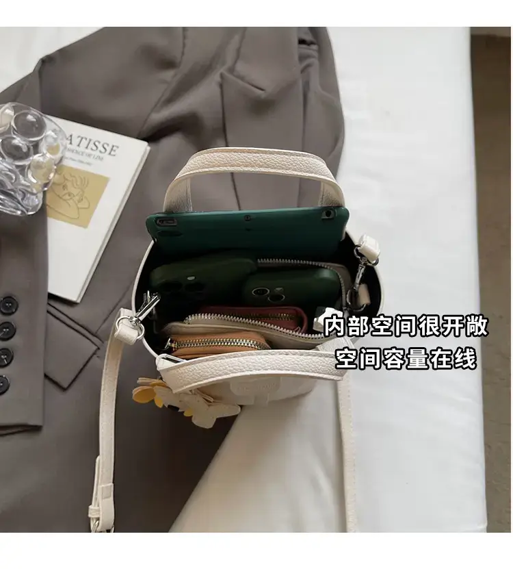 Beige Lychee Bucket Bag with Charm & Strap — feature 9