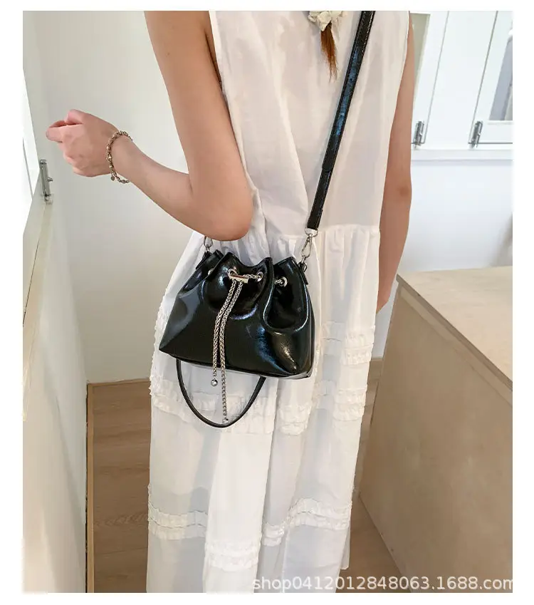 Black Oil Leather Bucket Bag with Chain Strap — feature 17