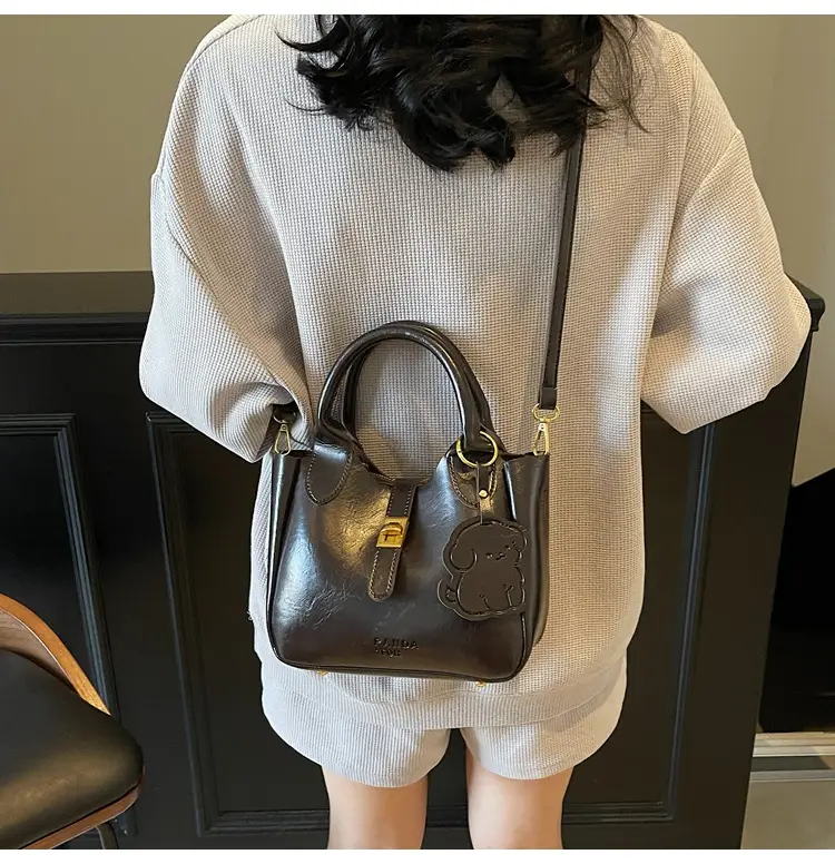 Women's Brown Leather Shoulder Bag with Gold Plated Handles — feature 11