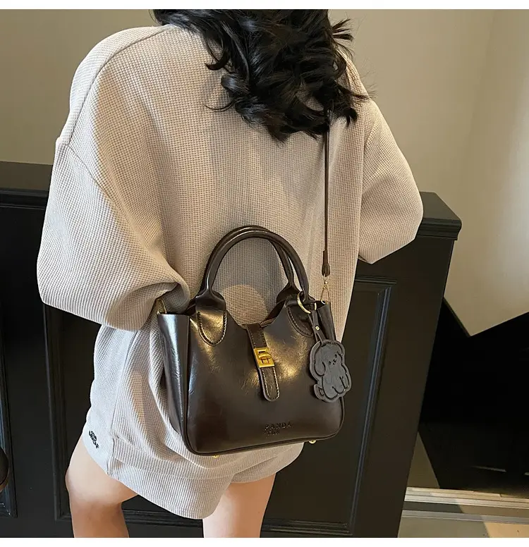 Women's Brown Leather Shoulder Bag with Gold Plated Handles — feature 12