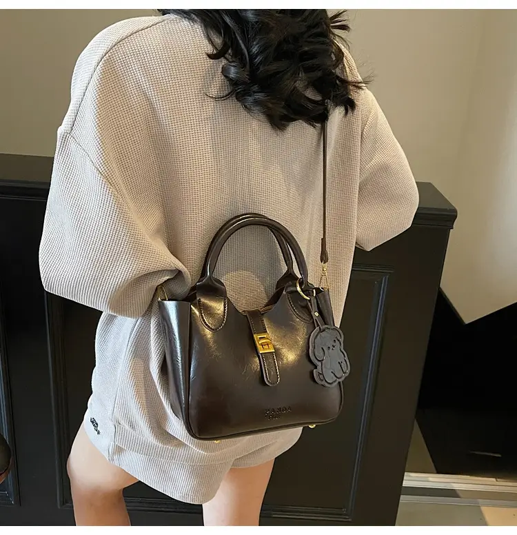 Women's Brown Leather Shoulder Bag with Gold Plated Handles — feature 13