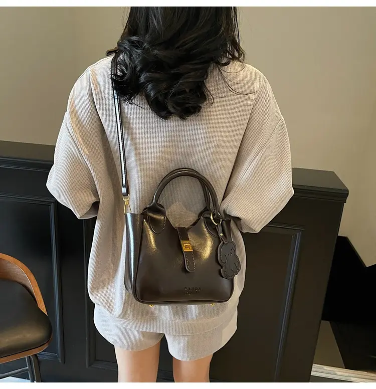 Women's Brown Leather Shoulder Bag with Gold Plated Handles — feature 14