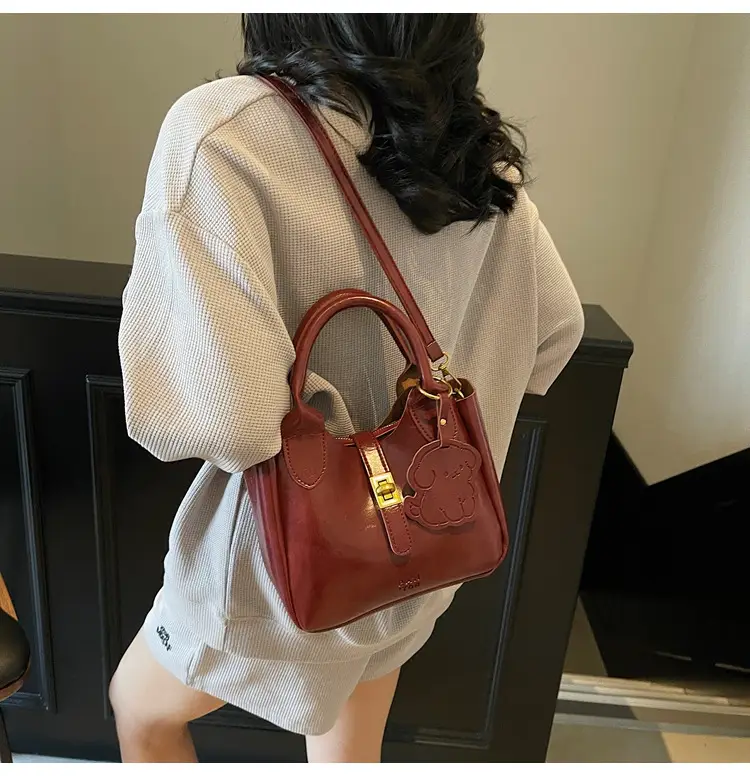 Women's Brown Leather Shoulder Bag with Gold Plated Handles — feature 15