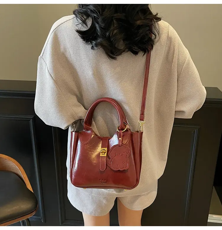Women's Brown Leather Shoulder Bag with Gold Plated Handles — feature 21