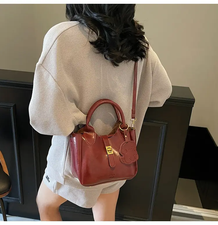 Women's Brown Leather Shoulder Bag with Gold Plated Handles — feature 22